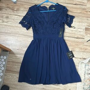 Knee length blue dress with crochet top size xs from lulus.